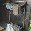 Suszarka do bielizny 3-poziomowa Tower z składanymi półkami lewa, L-128 cm, szara Foxydry, kupic - zdjecie №2 - small